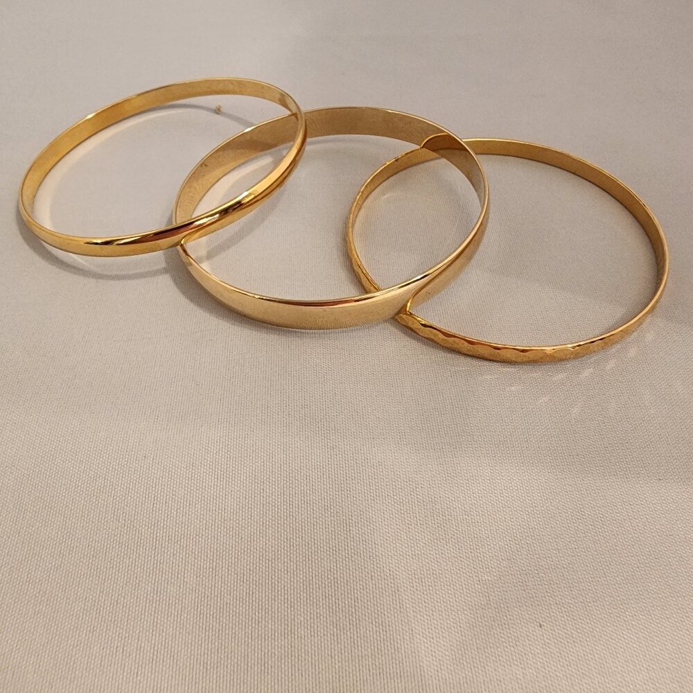 Gold toned bracelets size 7 1/2